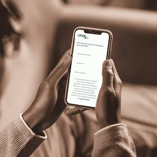 Person using phone for medical consultation